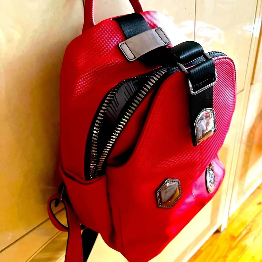ARMISE GOLD elegant design red and black backpack.